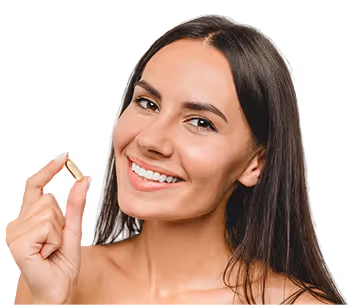 Smiling woman holding a softgel capsule